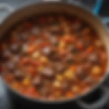 Simmering Cajun Beef Stew on the Stove A simmering pot of Cajun beef stew on the stove, showcasing vibrant colors