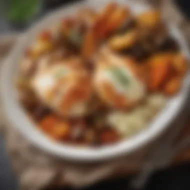 Plate of chicken and mozzarella with a side of vibrant roasted vegetables