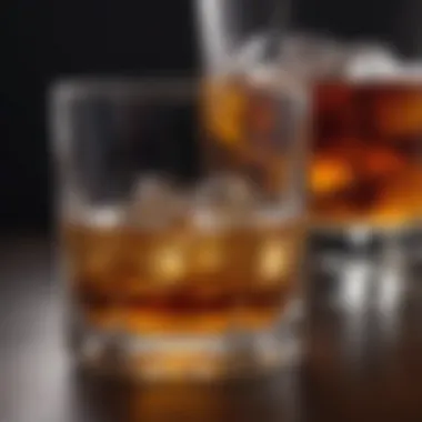 Exquisite Whiskey Glass An exquisite whiskey glass filled with amber liquid and ice