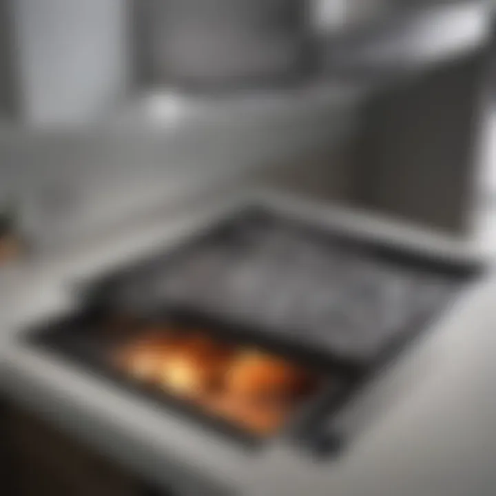 Before and after of an oven hood filter cleaning