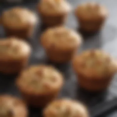 Freshly Baked Muffins in Paper Cups Close-up view of a paper muffin cup filled with freshly baked muffins, highlighting texture and color