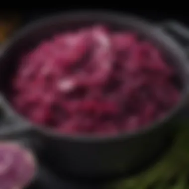 A pot of simmering red cabbage with aromatic herbs