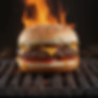 Sizzling Hamburger Patty Sizzling hamburger patty on a grill with flames in the background