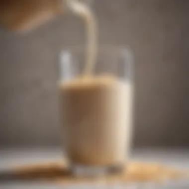 Close-up of oat milk being poured into a glass