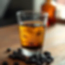 A close-up view of clear coffee extract in a glass.