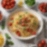 A plate of gluten-free fettuccine topped with fresh basil and cherry tomatoes.