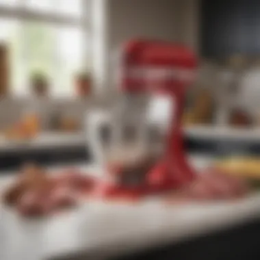 A KitchenAid mixer in a modern kitchen setting with the meat slicer attachment installed.