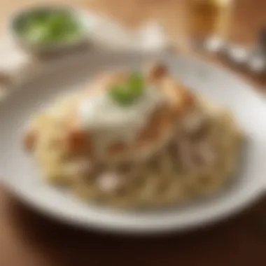 A beautifully plated Chicken Alfredo with garnishes