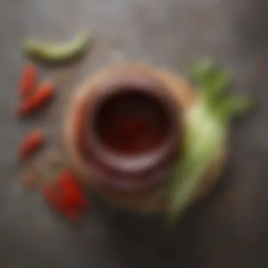 A homemade gochujang sauce jar with fresh ingredients beside it