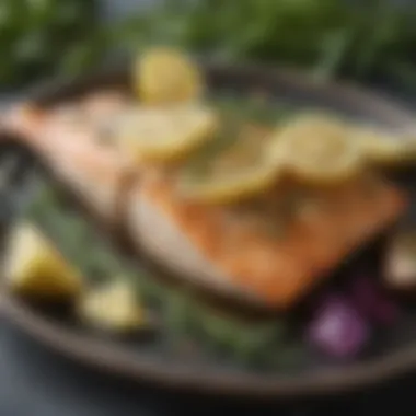 Close-up of baked fish fillet with herbs and lemon