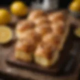 Golden-brown lemon sweet rolls on a rustic wooden table