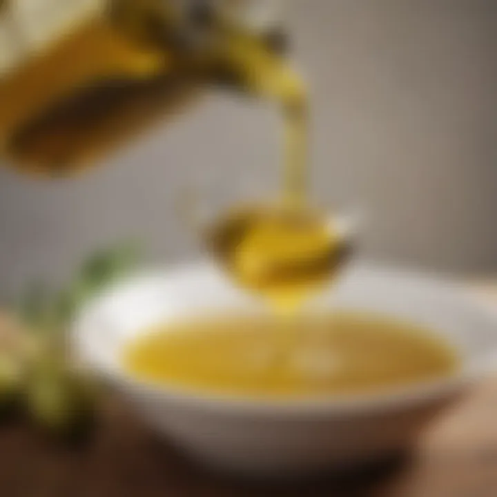 Olive oil pouring elegantly into a dish