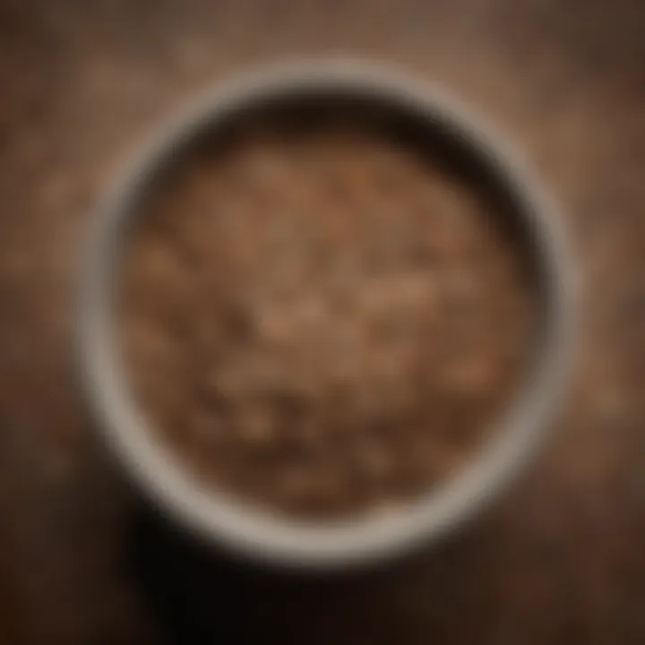 Close-up of ground seeds in a bowl, showcasing texture