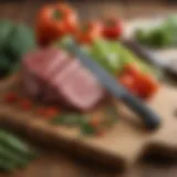 Sturdy meat cleaver resting on a wooden cutting board with fresh vegetables