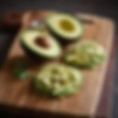 Sliced Avocado for Guacamole Sliced avocado on a wooden cutting board