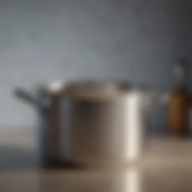 Close-up of a gleaming stainless steel pot reflecting light