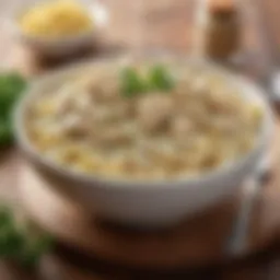 A bowl of creamy Chicken Alfredo pasta topped with parsley