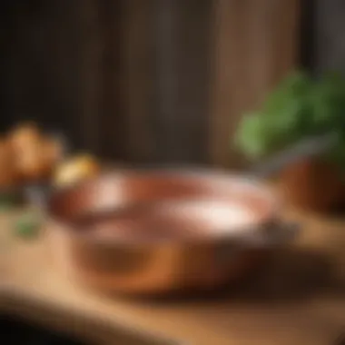 The Beauty of Mauviel Copper Cookware Elegant Mauviel copper saute pan on a wooden table
