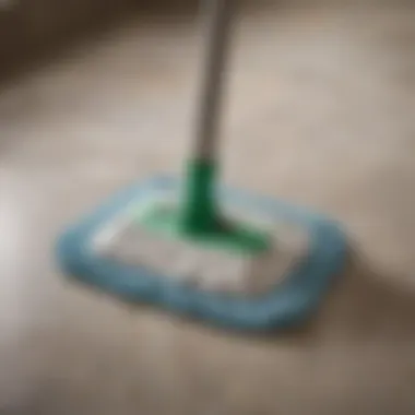 Close-up of a microfiber mop head on stone tiles