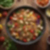 A vibrant bowl of quinoa salad topped with grilled chicken and colorful vegetables.