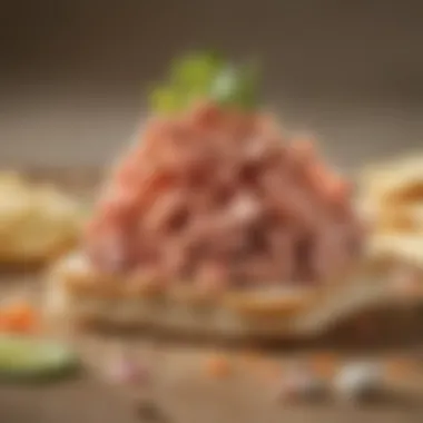 Cracker Elegantly Topped with Tuna Spread A close-up of a cracker topped with a generous amount of tuna spread