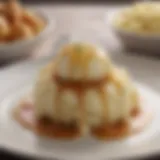 A close-up of creamy mashed potatoes topped with rich gravy.