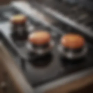 Close-up view of gas range knobs