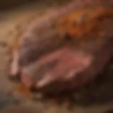 A close-up view of aromatic spices used in Longhorn steak rub
