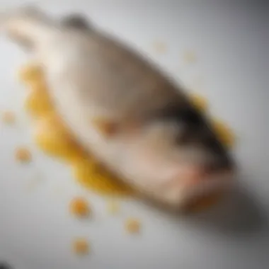 A close-up view of a perfectly cooked sea bass fillet, showcasing its flaky texture and golden crust