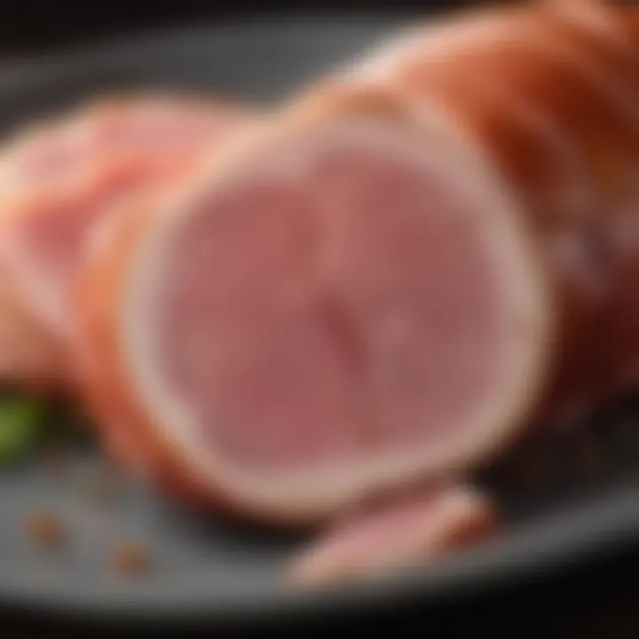 Close-up of Vermont spiral sliced ham showcasing its juicy texture and marbling.