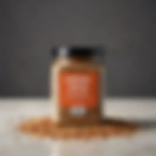 A close-up of a jar filled with Everything Bagel seasoning blend showcasing its unique texture and color.